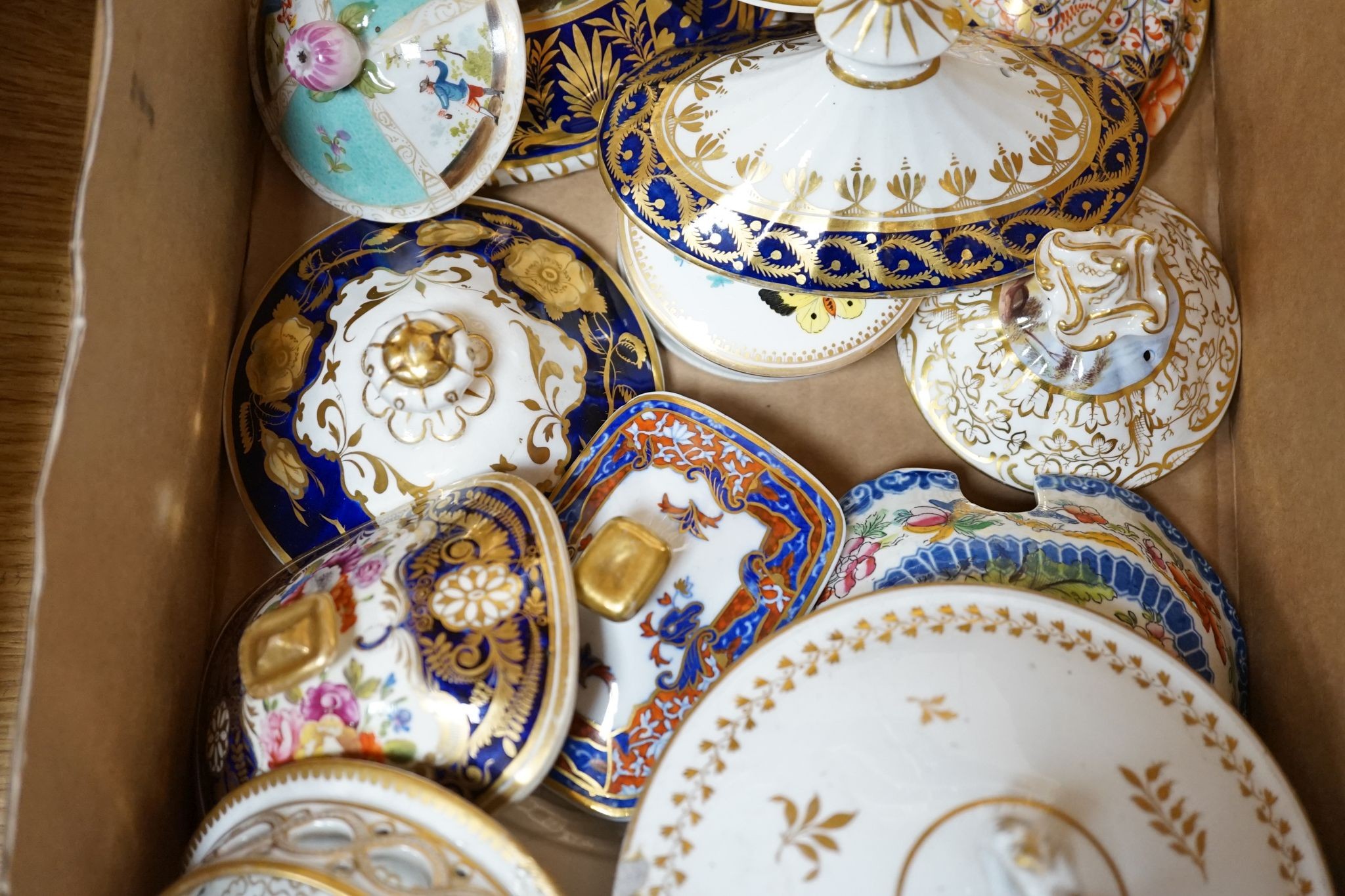 A mixed collection of porcelain covers